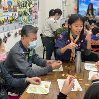 The Cub Scouts in the group also helped the elders make it.