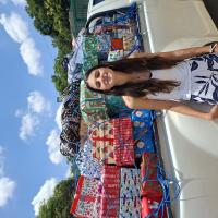 Syrine in front of all the gifts
