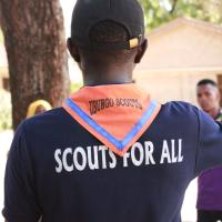 Country Coordinator For Messenger of Peace and Scout For SDG (GSL Aron Mlelwa) Providing Instructions to Scouts after arriving in Huruma Center. 