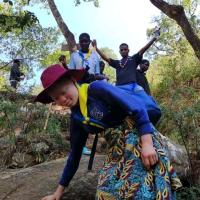 A scout from Friends of Mulanje Orphans Scout group during a mountain hike in Mulanje