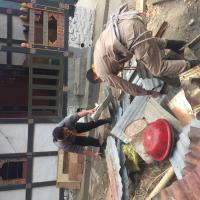 Clearing of roof sheets and material. 