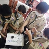 First Leaders show them our solar item to introduce.Scouts solved workbook, and build their lamps. We could have done in the train to camp.