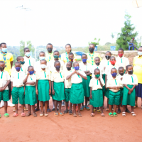 Clan St Georges Team with Children who were on street and Head Teacher of EP Ngoma where children studies