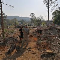 Members of the Lexden Camp Committee planting trees