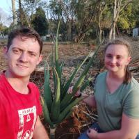My wife and I after planting our Tree Aloe