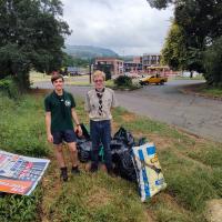 Squarelaw Rovers collecting rubish along the road next to the forsest