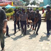 Carrying sick peoples to the First-Aid centre  