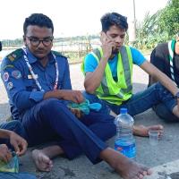 After work we are eating sitting on the street because there was no dry place due to flood water