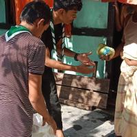 Distribution of food to the people who were trapped in the flood