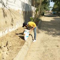 Picking up rubbish from land and protecting the plants and land.