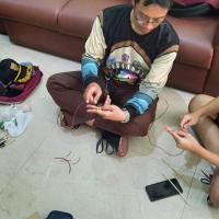 Make an “X” and 2 pass it from below 