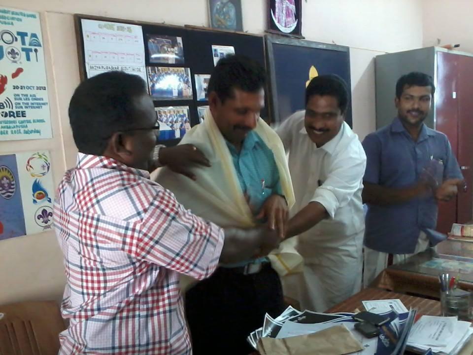 Honoring the District Association Secretary D. Harish for his achievement of Doctorate in Philosophy from Mahathma Gandhi University