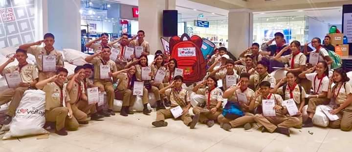 Scouts in the Philippines helps in repacking school supplies for IPs
