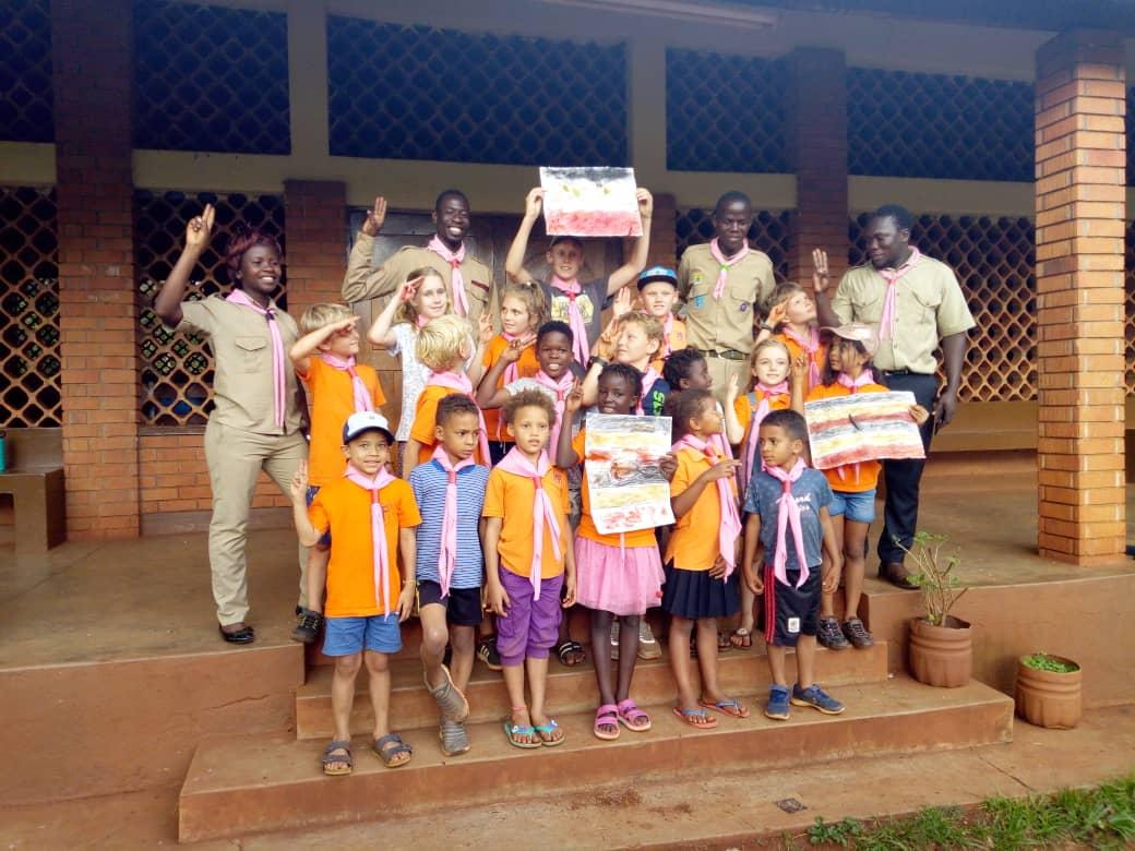 jinja Cub scouts share christmas with Local Community.