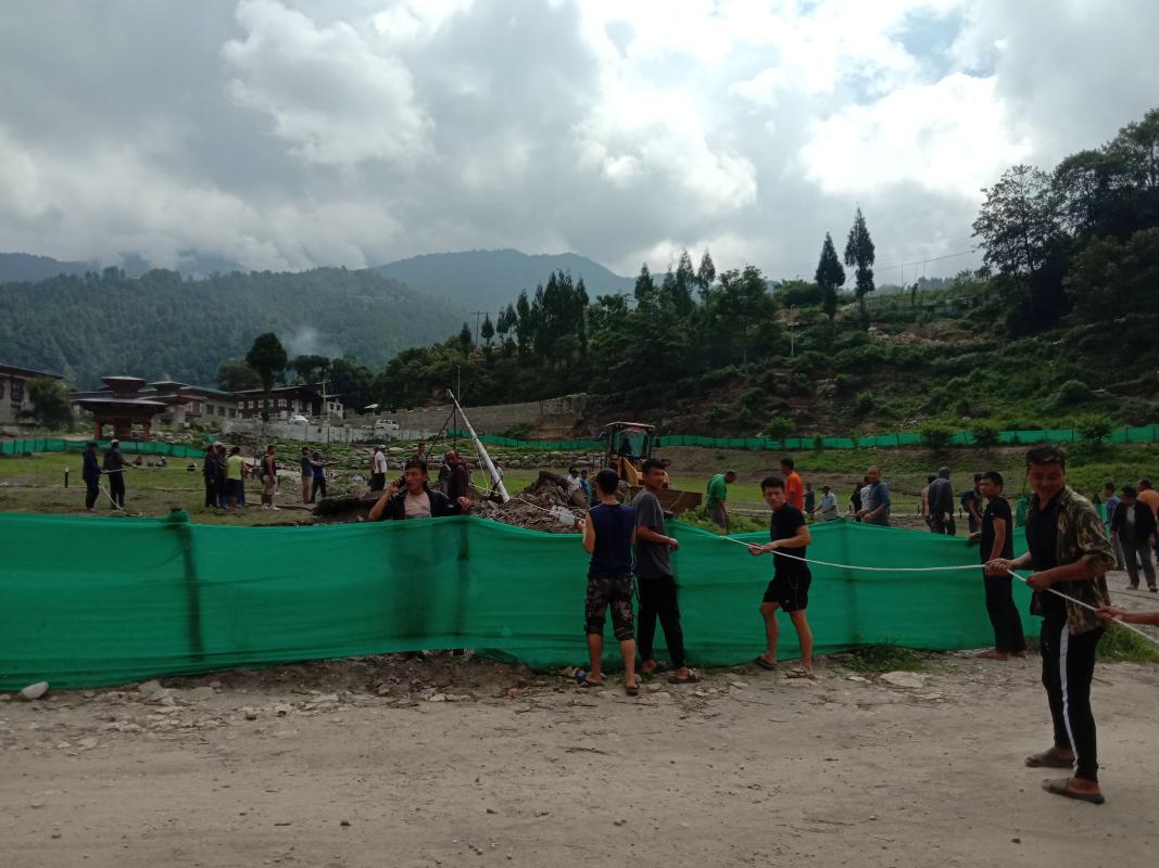 Uprooting and erecting of flagpole at chorten kora