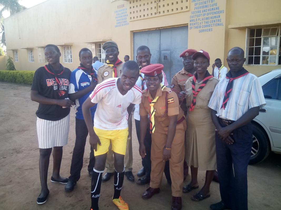 Scouts football club in soroti male prisons win 3:1 aganist ward 13 as the district scout leaders cheer them.