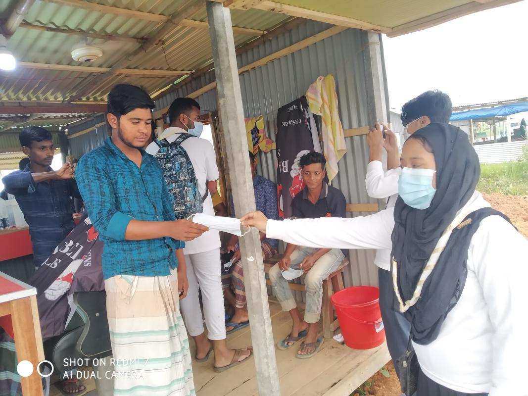 ঢাকা জেলা রোভার স্কাউটস কোভিড ১৯ সচেতন ক‍্যাপ। ম্কাস বিতরন।