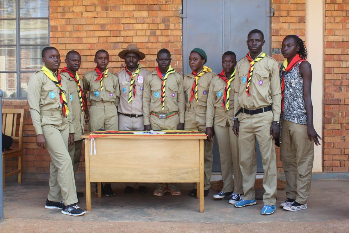 Investituring former street children into scouting  in Uganda 