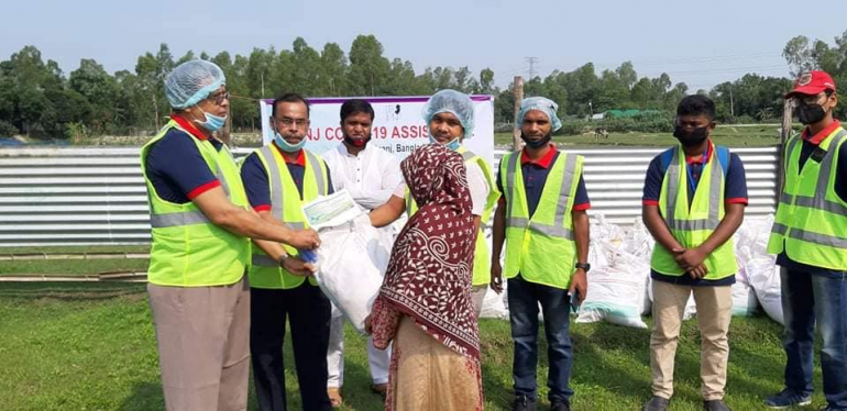 Eid items were distributed among the helpless and poor people.

