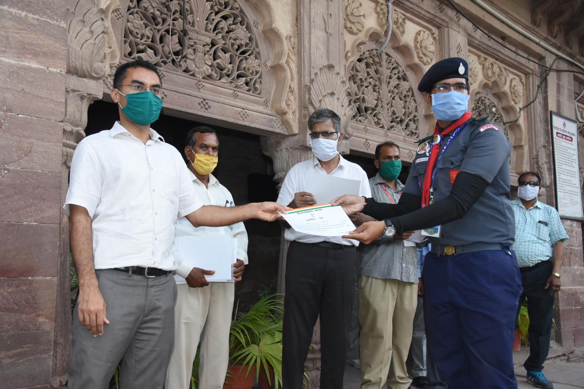 Jodhpur district collector Mr. Prakash Rajpurohit conferred the citation for providing remarkable services in Covid-19
