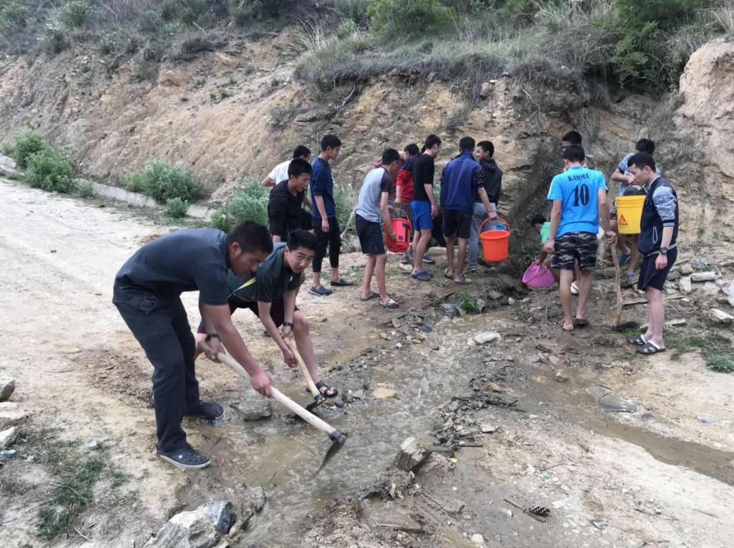 Road maintenance ( Road connecting the school and community
