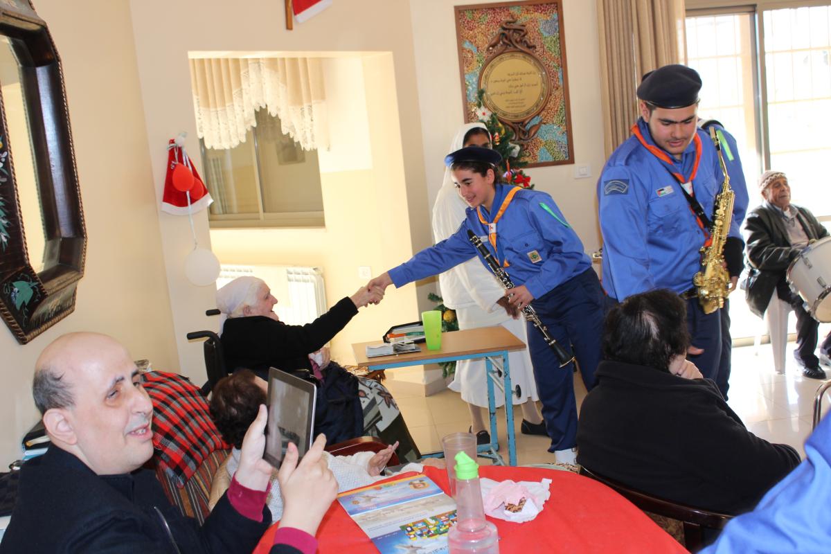 De la salle scout visited various associations during christmas time in order to bring joy to people