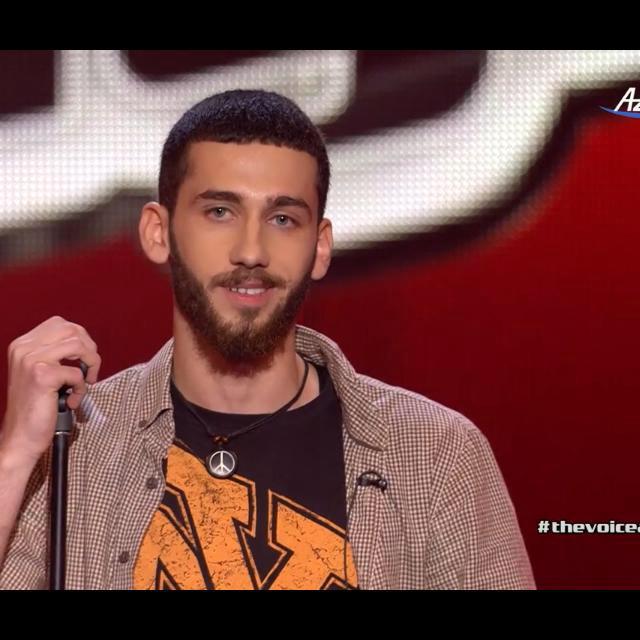 Rovshan Bayramov - a  member of Scout of Azerbaijan at the Contest "The Voice of Azerbaijan "