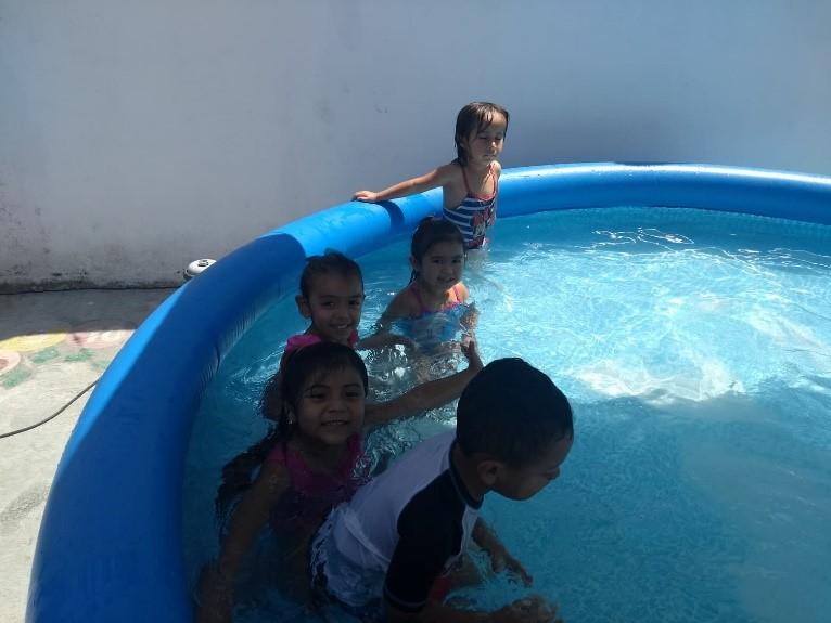 SWIMMING CLASSES TO A COMMUNITY