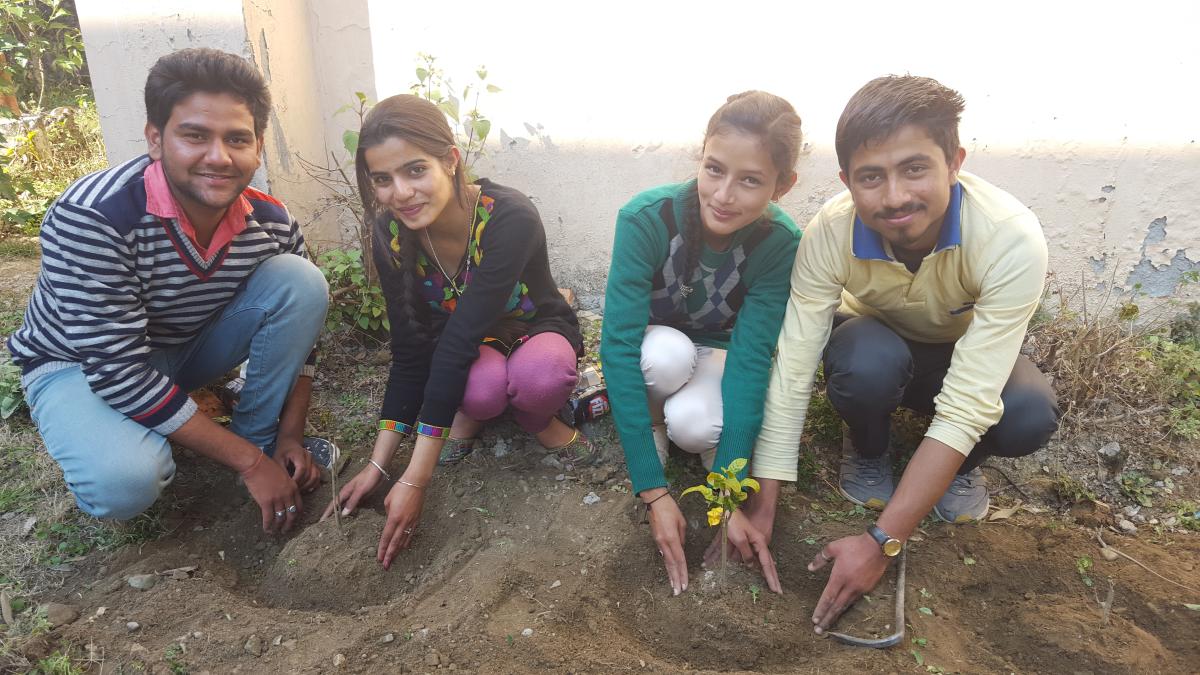 Making our campus green... by planting trees .