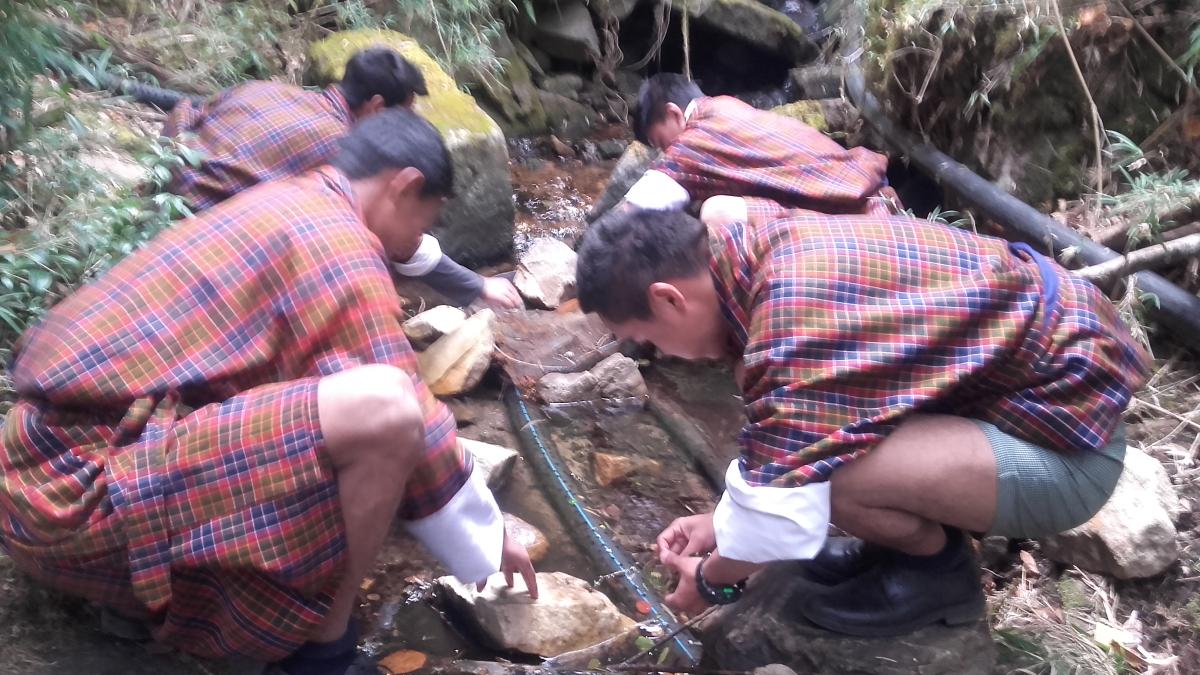 Water Source cleaning for the School and Community