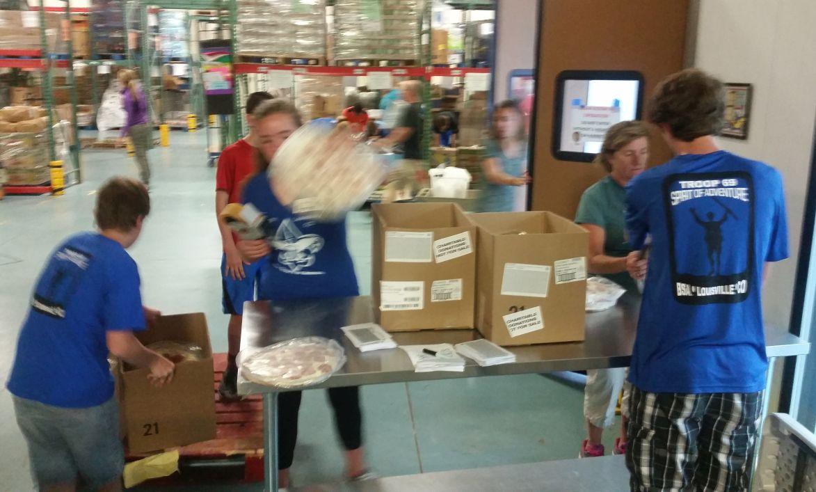Community Food Share prep for family pickup