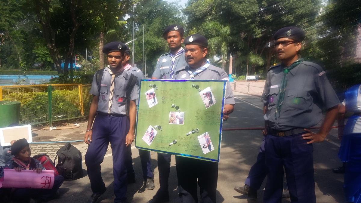 one day cleenliness awarness programe and  realy with scout and guide