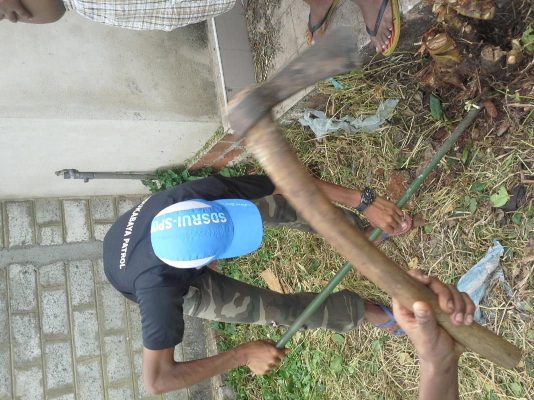 Cleaning the land housing the Negombo District Scout Association