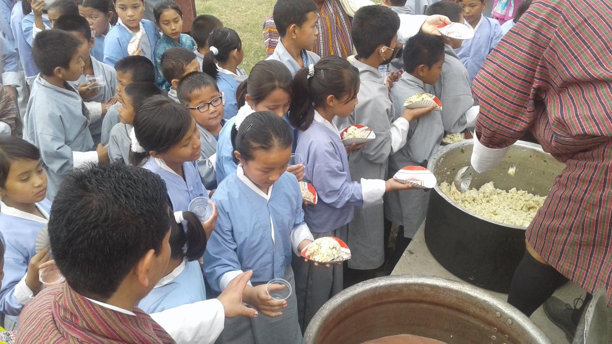 Mass Suja and Desi serving to the schools of Samtse