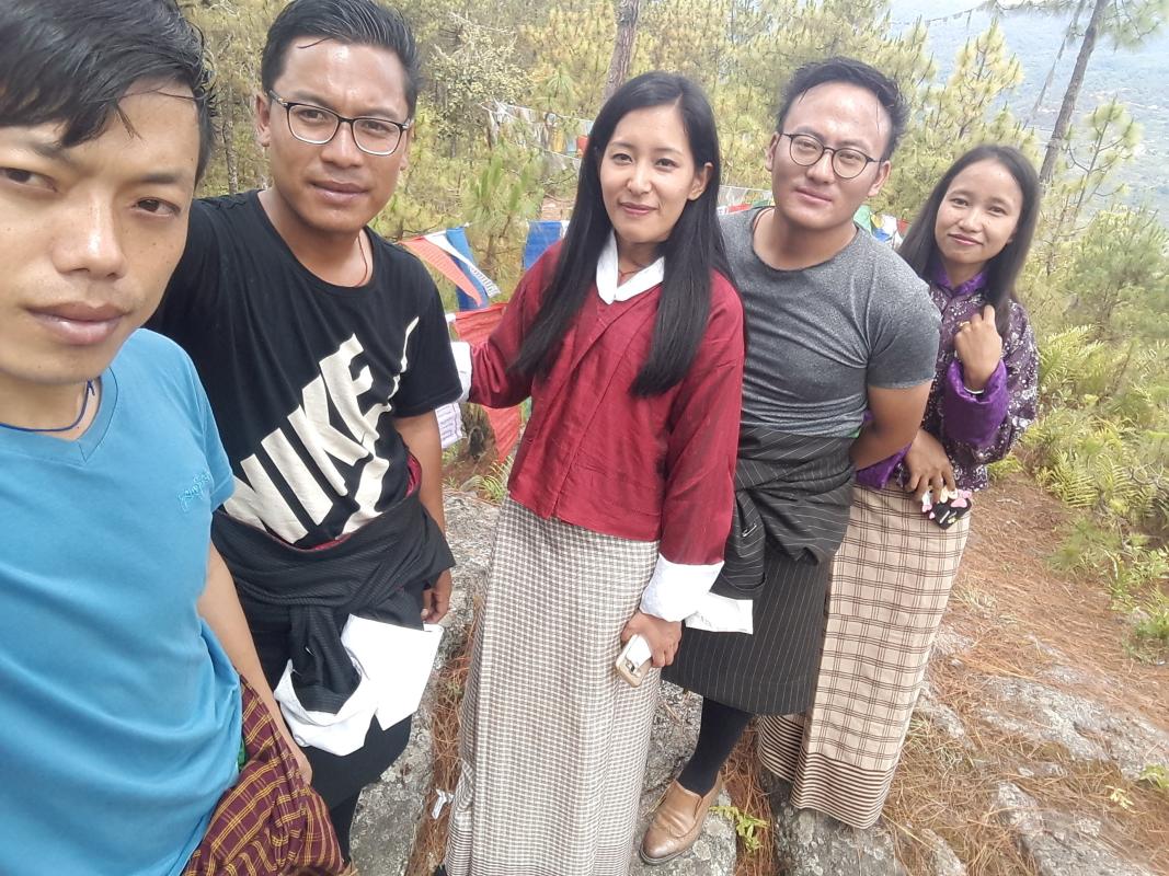 Hoisting of prayer flag around Samtengang Lake area.
