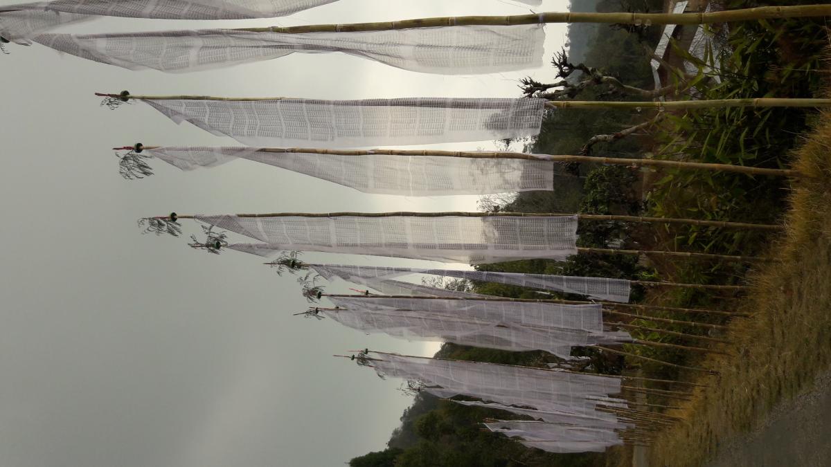"Eracting prayer Flags on world happy day"