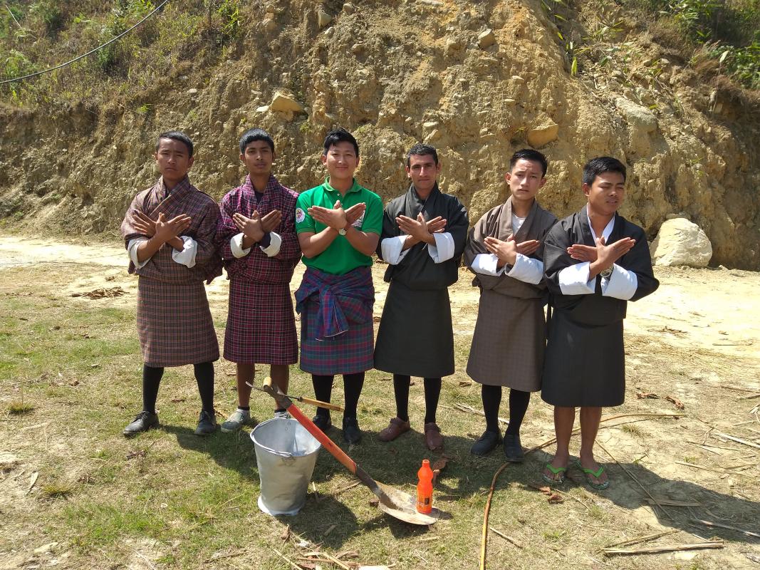 Scouts of Jangchubling volunteer to clean the water source 