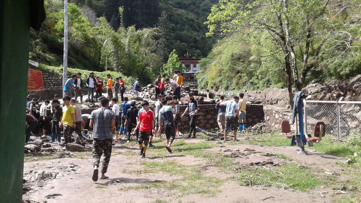 Cleaned around the naykithang at ECCD after flood.