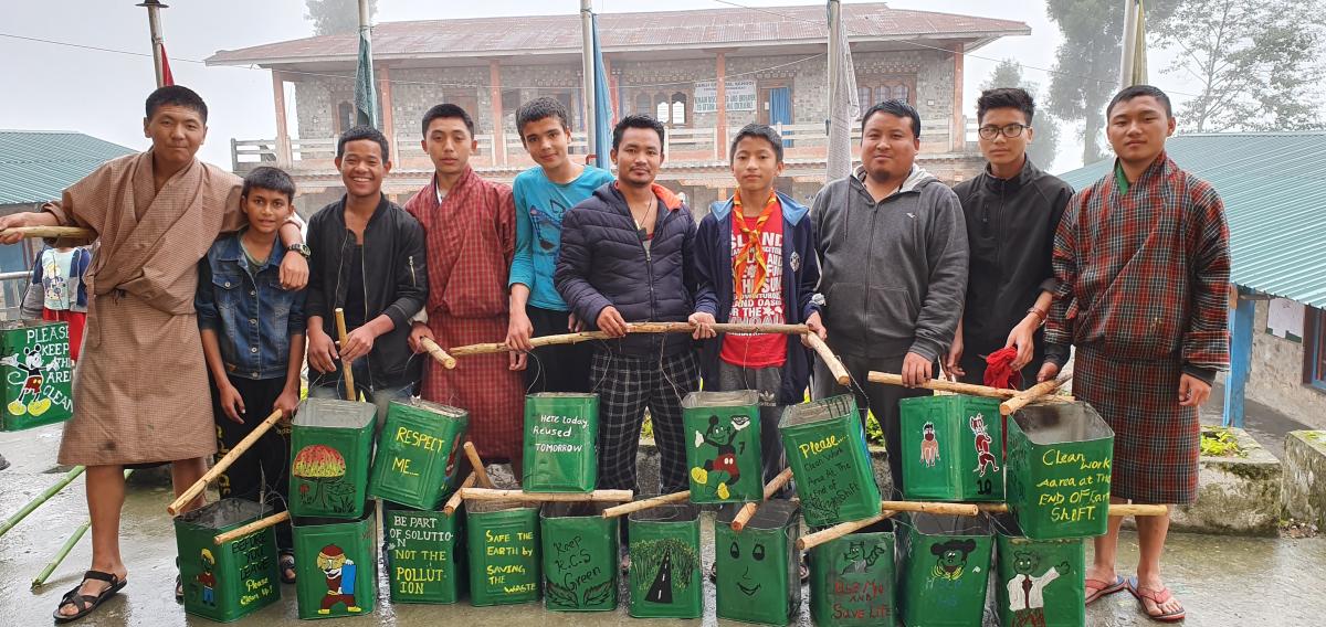 Fixing Dustbins in school campus