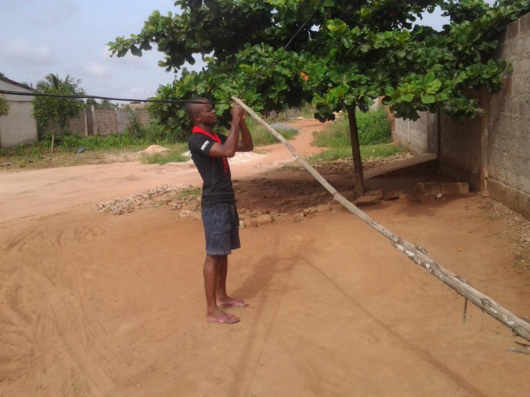 A Scout of Togo and his brother restored a power line in their community