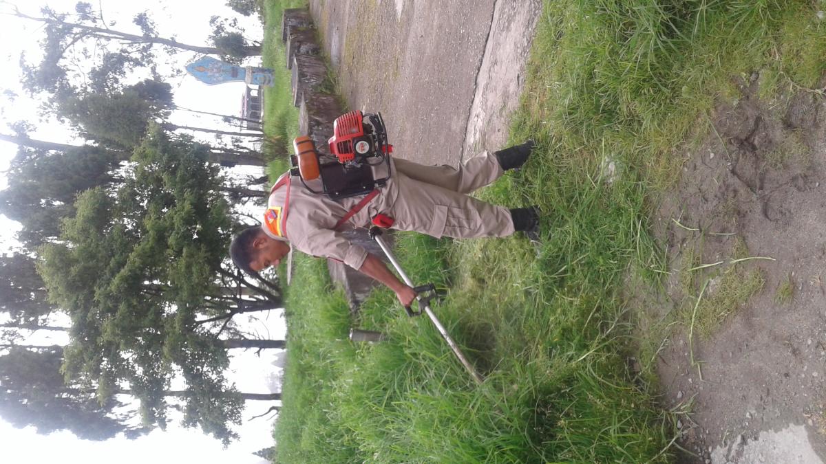 Grass cutting near the Hostel Premises (Chukha Central School)