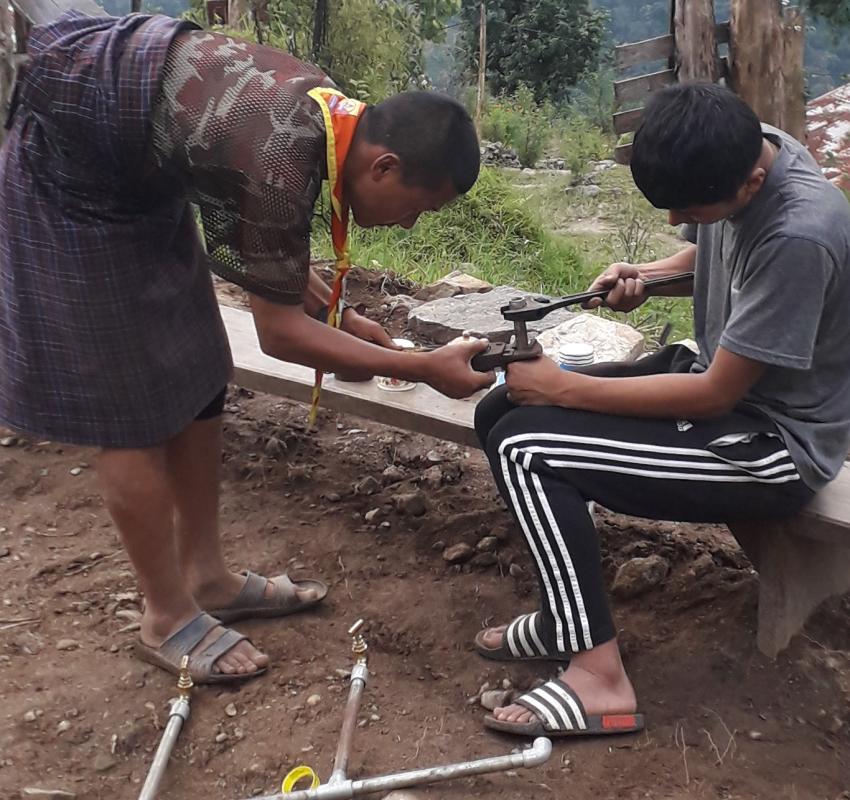 # - Helping Health In-charge to construct Tippy Tape for upcoming Hand Washing Day program