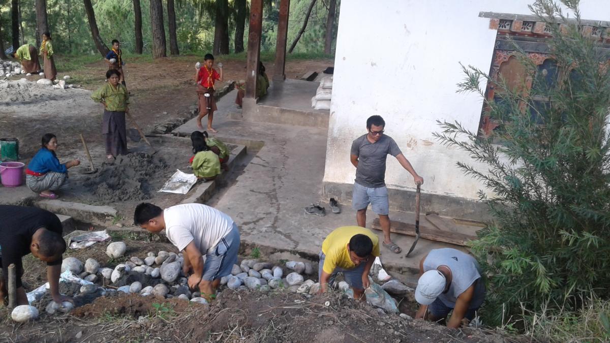 Making hand washing stand in school.