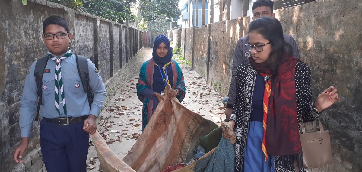 Collecting cloth from house