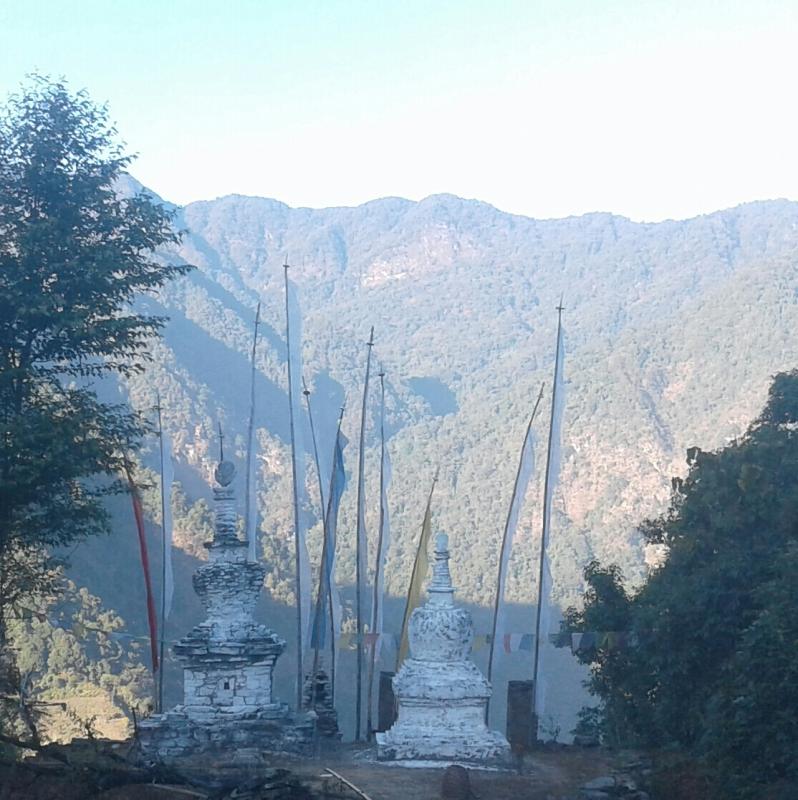 White washing of chorten  (stupa)