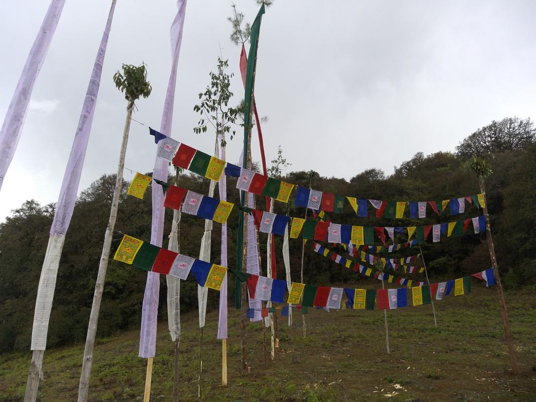 Eracting of prayer flags.