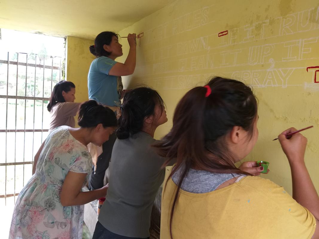 Repainting of toliets in the school