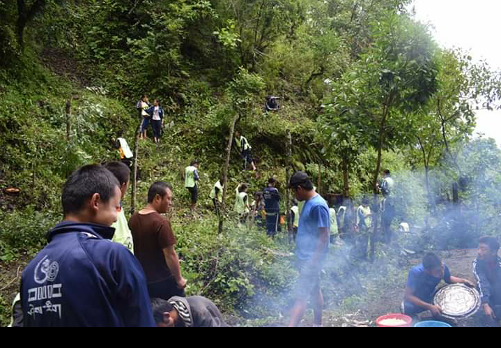 Cleaning community water source