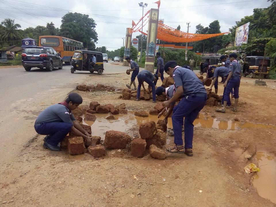 Repairing the side of the road at Nehrunagar