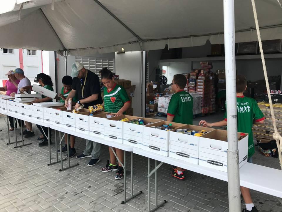 Our Scouts are helping out the red cross of Aruba 